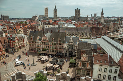 Old buildings seen from the gravensteen castle at ghent. a city full of gothic buildings in belgium.