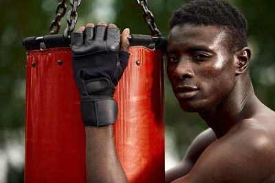 Close-up of man exercising in gym