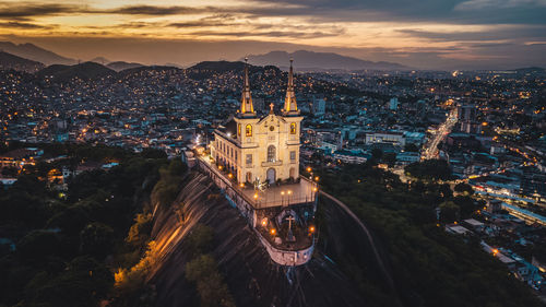 High angle view of illuminated buildings in city