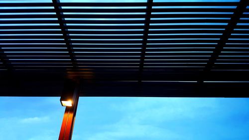 Low angle view of illuminated light against sky