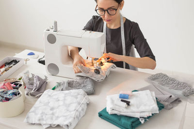 Portrait of woman working on table