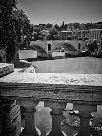 Bridge over river against sky