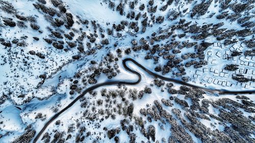 High angle view of snow on mountain road
