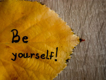 Close-up of yellow text