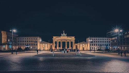 Illuminated street at night