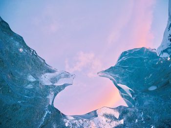 Scenic view of mountains against sky during winter