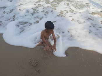 High angle view of woman on beach