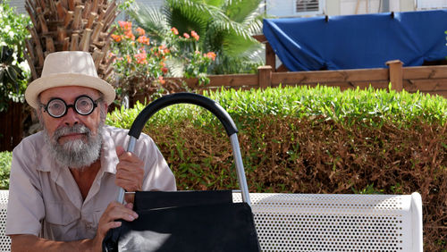 Retired senior man with shopping basket 