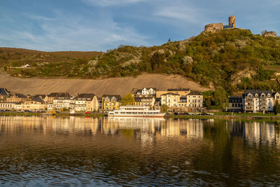 View at the city of bernkastel-kues at river moselle and mountains with vineyards