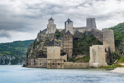 Historic building against cloudy sky