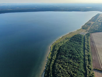 High angle view of sea shore against sky