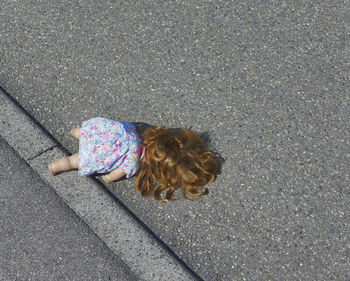 High angle view of doll on street