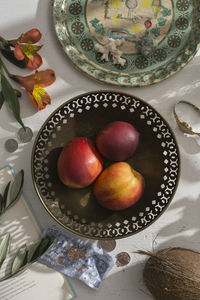 High angle view of fruits in bowl on table