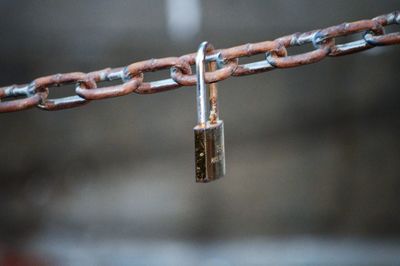 Close-up of padlock on chain