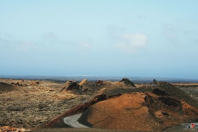 Scenic view of volcanic landscape against sky