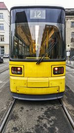 Yellow car on street in city