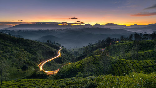 Scenic view of mountains against sky during sunset