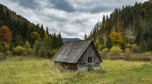 House on field against sky