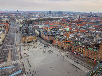 High angle view of city buildings against sky