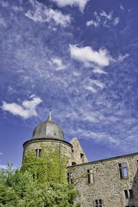 Low angle view of old building against sky