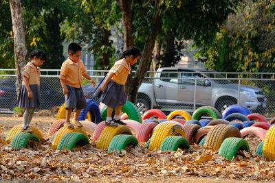 Group of people playing on plants