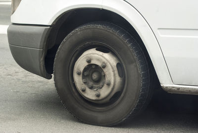 Close-up of vintage car on street