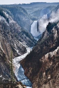 High angle view of waterfall in mountains