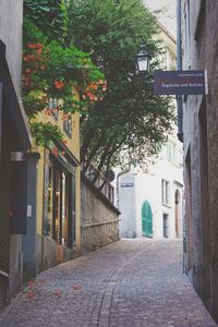 Alley amidst buildings in city