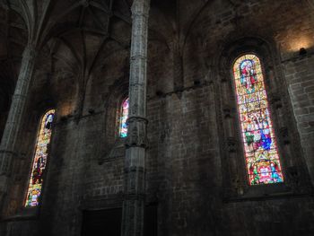 Low angle view of stained glass of historic building