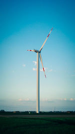 Wind turbines on field