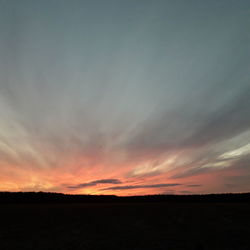 Scenic view of dramatic sky during sunset