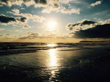 Scenic view of sea at sunset