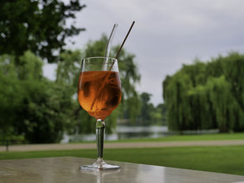 Close-up of wineglass on table