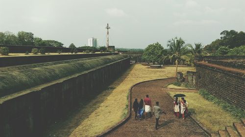 People on walkway at st angelo fort