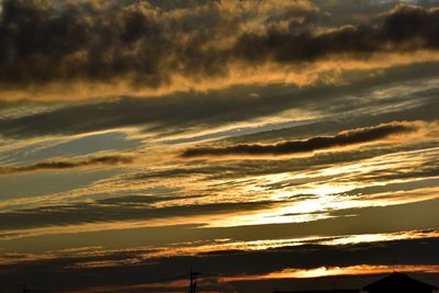 Low angle view of cloudy sky during sunset