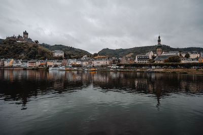 Reflection of buildings in lake
