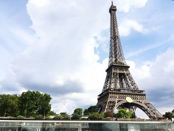 View of tower against cloudy sky