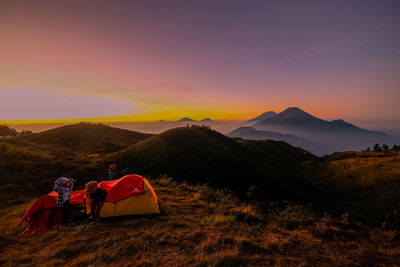 Scenic view of mountains against sky during sunset