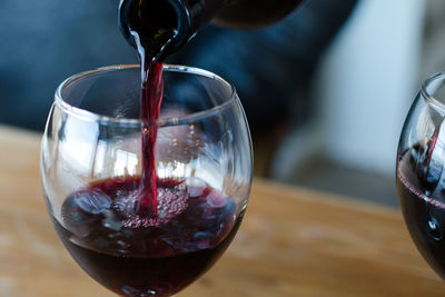 Close-up of wineglass on table