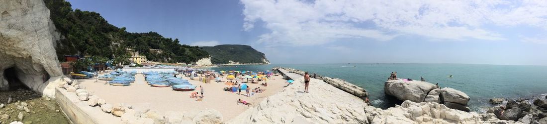 Panoramic view of sea shore against sky