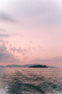 Scenic view of sea against sky at sunset