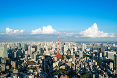 Panoramic view of buildings in city against sky