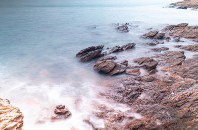 Sea with smooth wave and rock landscape. nature of seascape in vacation holiday travel relax time.