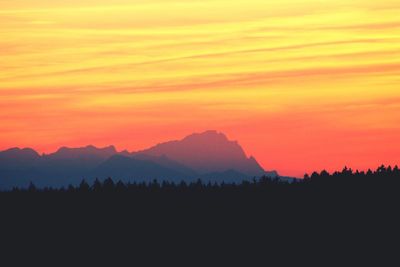 Scenic view of mountains at sunset