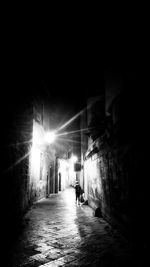 Narrow alley along buildings