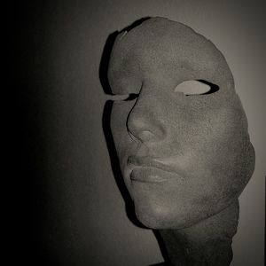 Close-up of human face against white background