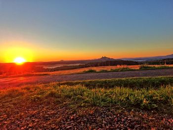 Scenic view of landscape at sunset