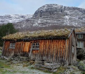 Dilapidated shed at the foot of the mountains