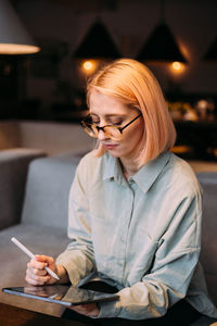 Young woman using mobile phone