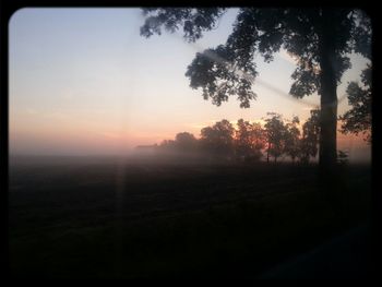 Scenic view of landscape at sunset